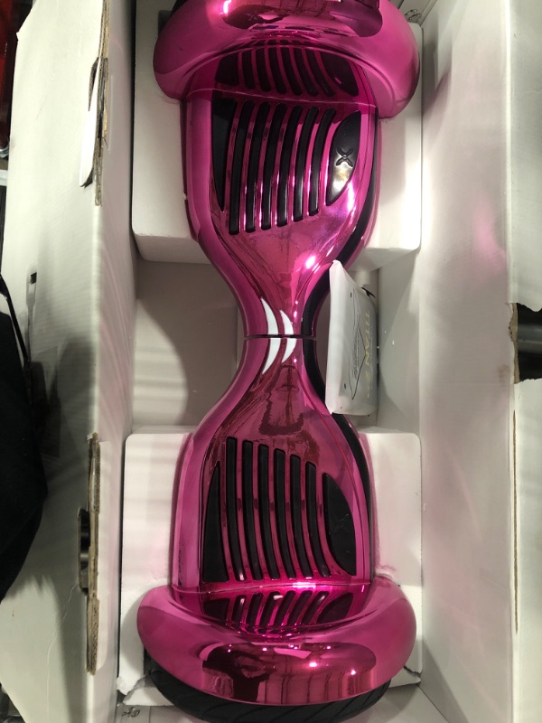 Photo 2 of ***see notes***Hover-1 Titan Electric Hoverboard | 8MPH Top Speed, 8 Mile Range, 3.5HR Full-Charge, Built-In Bluetooth Speaker, Rider Modes: Beginner to Expert Pink