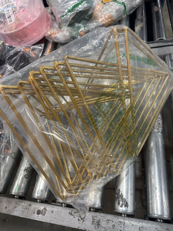 Photo 1 of acrylic gold triangle frame holders or folder racks 