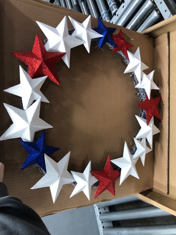 Photo 1 of 21in. Americana Wreath with Stars Red White and Blue