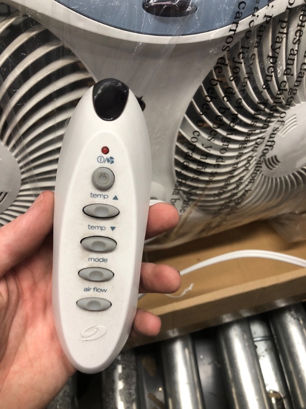 Photo 3 of * Broken * Bionaire Window Fan with Twin 8.5-Inch Reversible Airflow Blades and Remote Control, White White 2 Blades Electronic control with LCD screen Window Fan