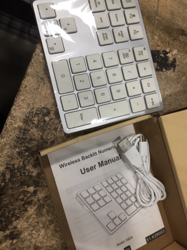 Photo 2 of Doohoeek Backlit Bluetooth Numeric Keypad for Laptops and Computers, Number Pads 34 Keys with 7-Color Backlight for MacBook & Windows, Silver White Bluetooth White