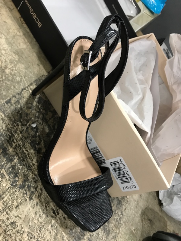 Photo 1 of BCBGeneration Women's BLACK LIZARD  HEEL           size 9                                                                                                                                                                                                      