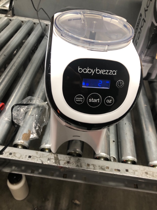 Photo 2 of Baby Brezza Formula Pro Mini Baby Formula Maker – Small Baby Formula Mixer Machine Fits Small Spaces and is Portable for Travel– Bottle Makers Makes The Perfect Bottle for Your Infant On The Go Formula Pro Mini Dispenser Machine