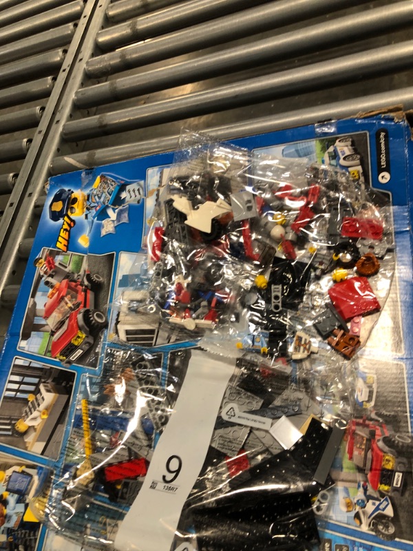 Photo 1 of LEGO City Police Station 60141 Building Kit with Cop Car, Jail Cell, and Helicopter, Top Toy and Play Set for Boys and Girls (894 Pieces) (Discontinued by Manufacturer)