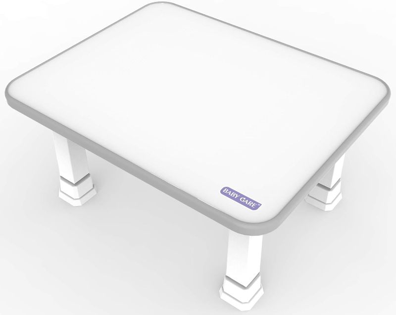 Photo 1 of Baby Care Kids Folding Floor Table w/Adjustable Heights - for Play, Reading, and Snack Time and More (White/Grey)