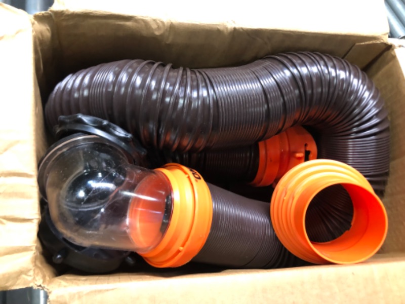 Photo 3 of Camco RhinoFLEX RV Sewer Hose Kit with Swivel Transparent Elbow and 4-in-1 Dump Station Fitting, Brown, 15 Feet (39770) 15ft Sewer Hose Kit Frustration-Free Packaging