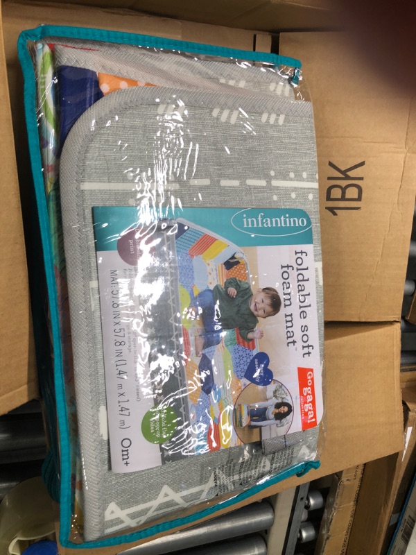 Photo 1 of Infantino Foldable Soft Foam Mat, Extra Large Double-Sided Cushioned Play Mat with Pop-Up Sides, Non Slip Crawling & Playing for Infants and Toddlers