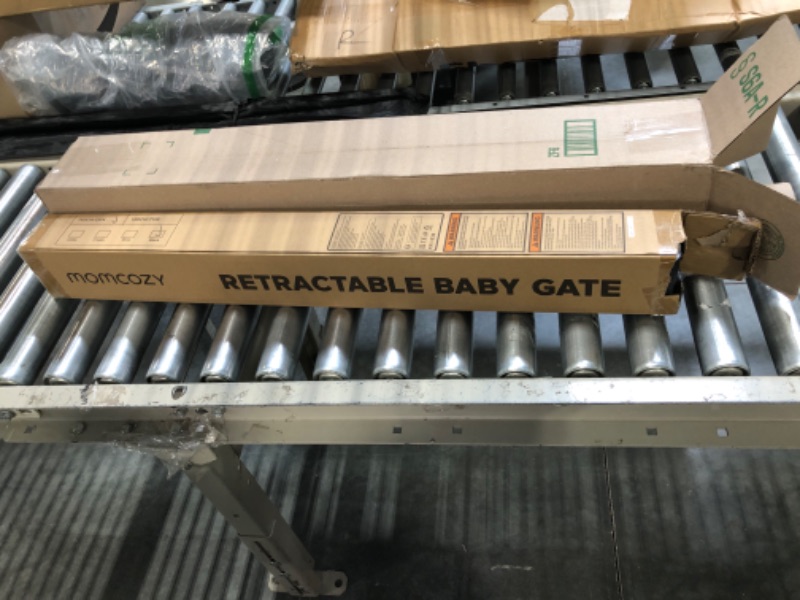 Photo 1 of Momcozy Retractable Baby Gate