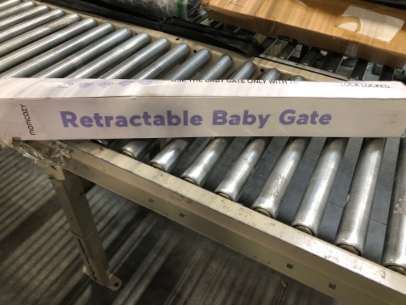 Photo 1 of Momcozy Retractable Baby Gate