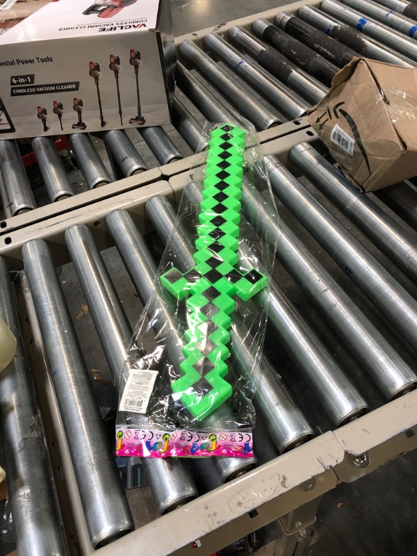 Photo 2 of Fun Central LED Light Up Pixel 8-Bit Toy Sword for Kids - Green