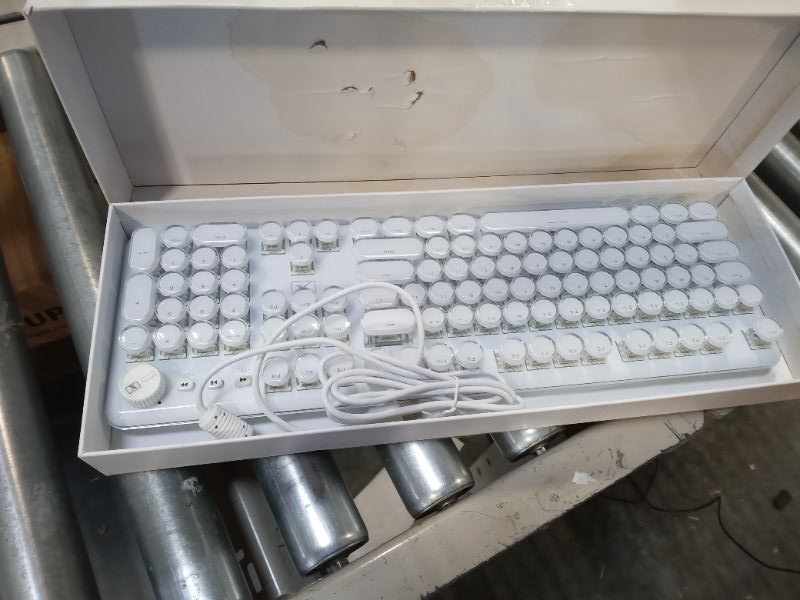 Photo 1 of CC MALL Gaming Keyboard,Retro Punk Typewriter-Style, Blue Switches, White Backlight, USB Wired, for PC Laptop Desktop Computer, for Game and Office, Stylish White Mechanical Keyboard White round Keycaps