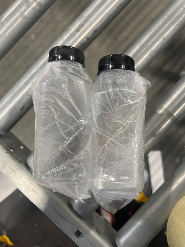 Photo 2 of (2) 16 oz. Clear Food Grade Plastic Juice Bottles with Tamper Evident Caps 2/pack (Black Lids)