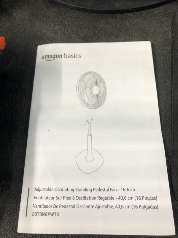 Photo 1 of Amazon Basics Oscillating Dual Blade Standing Pedestal Fan with Remote - 16-Inch, Black