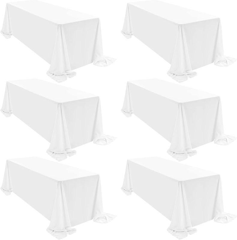 Photo 1 of 6 Pack Polyester Tablecloths, White 90 x 156 Inch Polyester Table Cloth for 8 Foot Rectangle Tables, Stain and Wrinkle Resistant Washable Fabric Table Cover for Wedding Banquet Restaurant Party