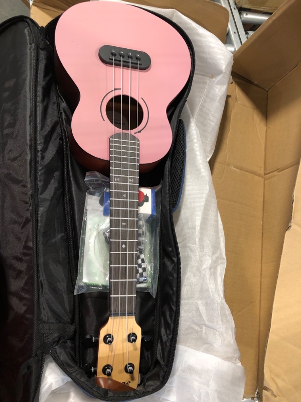 Photo 2 of Asmuse Concert Ukulele Mahogany 23 Inch Ukelele for Kids with Free Online Lesson Gig Bag Strap Nylon String Tuner Picks (Pink)