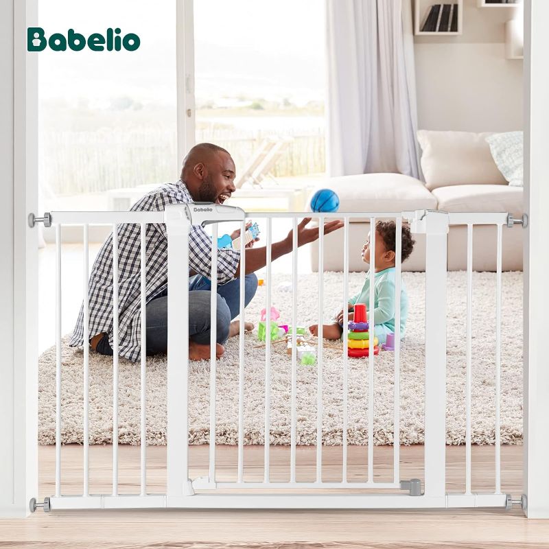 Photo 1 of BABELIO Metal Baby Gate Dog Gate 29-48 Inch Extra Wide Pet Gate for Stairs & Doorways, Pressure Mounted Walk Thru Child Gate with Door, NO Need Tools NO Drilling, with Wall Cups