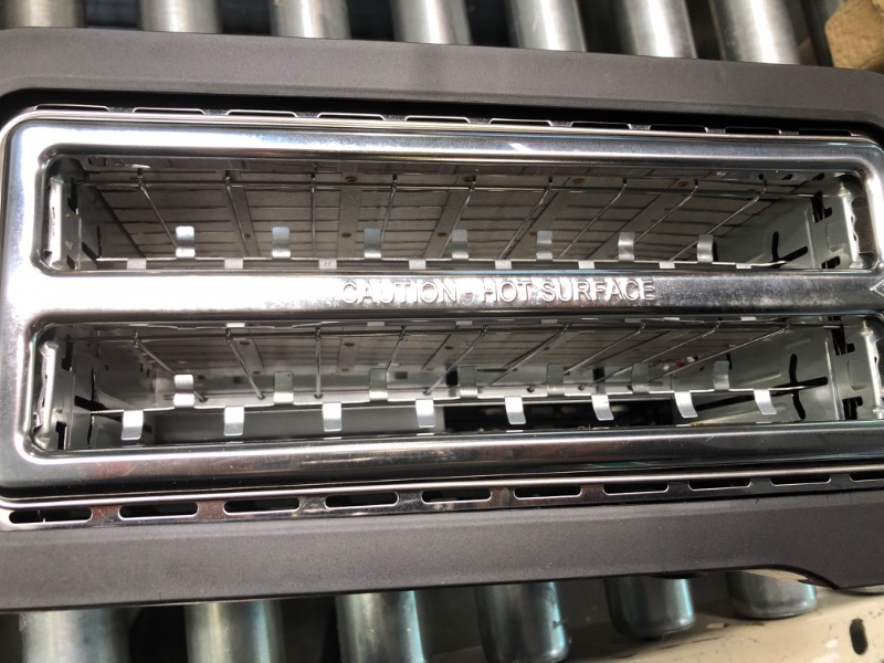 Photo 1 of Elite Gourmet ECT4400B# Long Slot 4 Slice Toaster, Countdown Timer, 6 Toast Setting, Defrost, Cancel Function, Built-in Warming Rack, Extra Wide Slots for Bagel Waffle, Stainless Steel