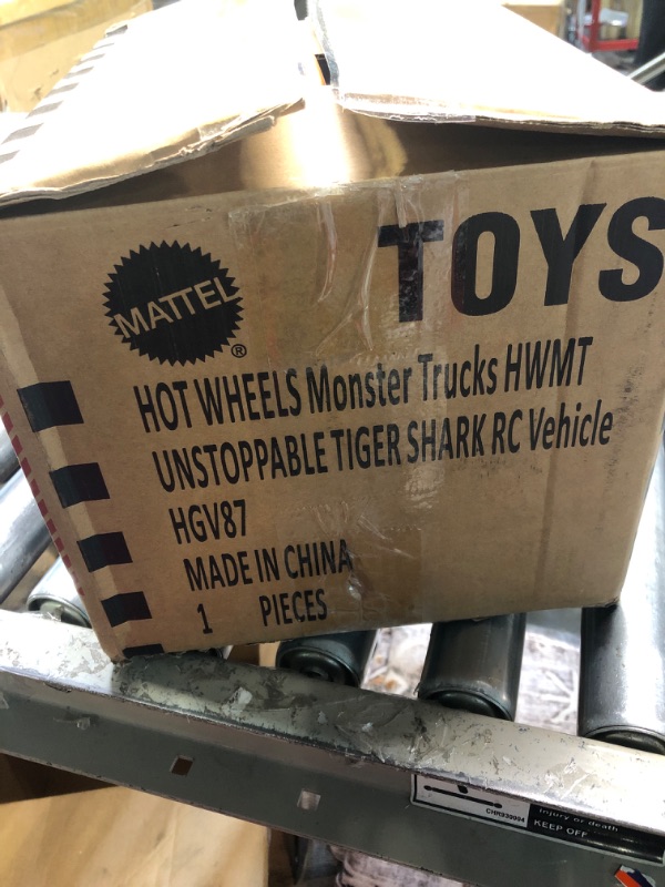 Photo 3 of Hot Wheels Monster Trucks, Remote Control Car, Monster Truck Toy with All-Terrain Wheels, 1:15 Scale Unstoppable Tiger Shark RC