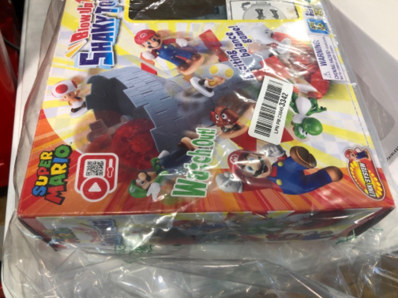 Photo 2 of Epoch Games Super Mario Blow Up! Shaky Tower Balancing Game, Tabletop Skill and Action Game with Collectible Action Figures