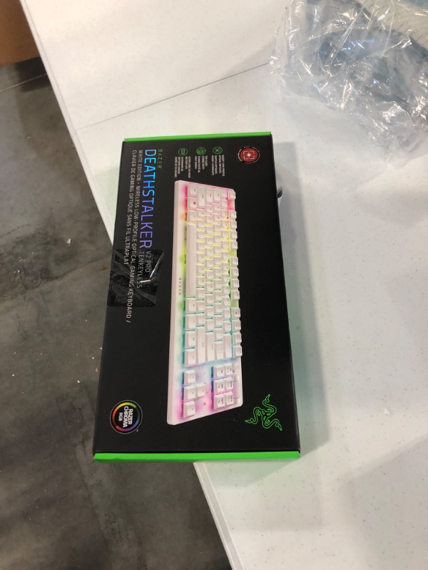 Photo 2 of Razer DeathStalker V2 Pro TKL Wireless Gaming Keyboard: Low-Profile Optical Switches - Linear Red - HyperSpeed Wireless & Bluetooth 5.0 - Up to 200 Hrs - Ultra-Durable Coated Keycaps - RGB - White White V2 Pro TKL Linear Optical Switch