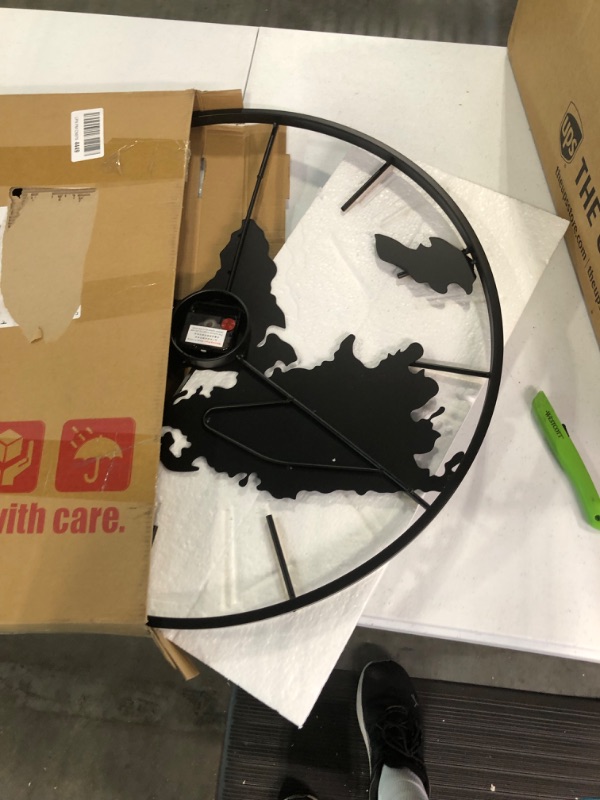 Photo 1 of Large World Map Wall Clock, Metal Minimalist Modern Clock,Round Silent Non-Ticking Battery Operated Wall Clocks for Living Room/Home/Kitchen/Bedroom/Office/Farmhouse Decor (24 Inch) Color2 One Size