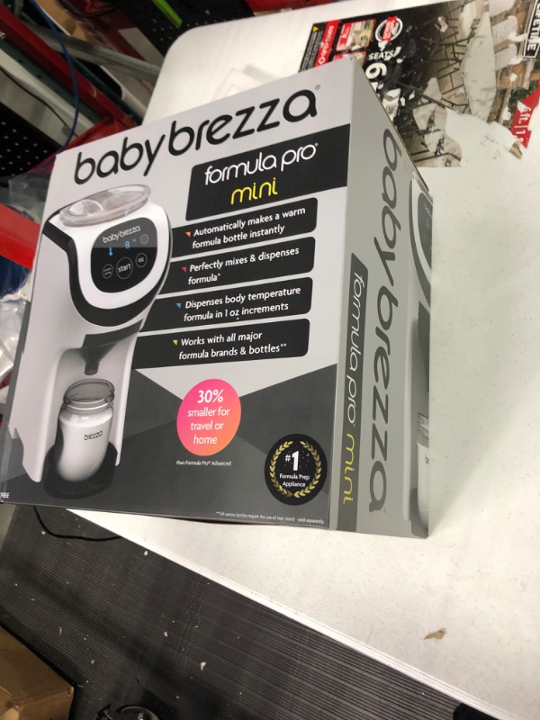 Photo 5 of Baby Brezza Formula Pro Mini Baby Formula Maker – Small Baby Formula Mixer Machine Fits Small Spaces and is Portable for Travel– Bottle Makers Makes The Perfect Bottle for Your Infant On The Go Formula Pro Mini Dispenser Machine