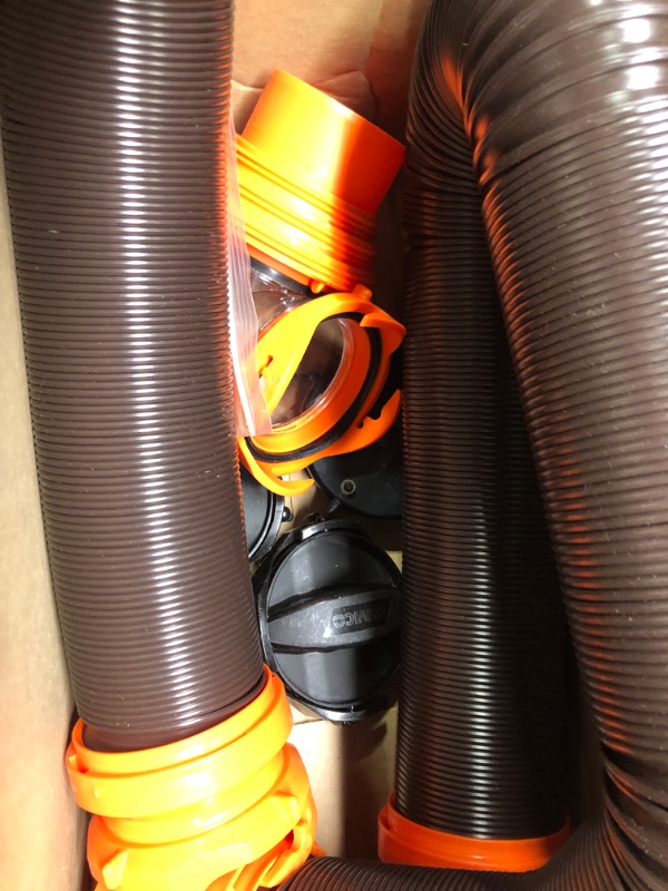 Photo 1 of Camco 20' (39742) RhinoFLEX 20-Foot RV Sewer Hose Kit, Swivel Transparent Elbow with 4-in-1 Dump Station Fitting-Storage Caps Included , Black , Brown 20ft Sewer Hose Kit Frustration-Free Packaging