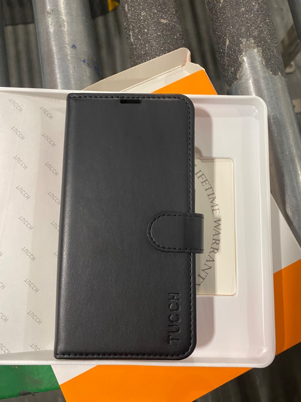 Photo 1 of Tucch wallet phone case-unknown phone size and brand