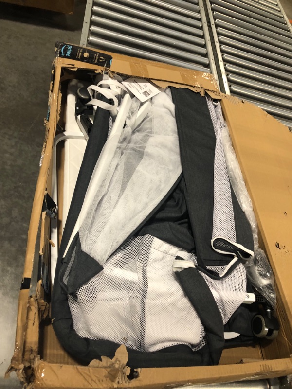 Photo 1 of Baby Bassinet Bedside Sleeper for Baby with Wheels and Storage Basket ,All Mesh Portable Bedside Bassinet Co Sleeper for Newborn /Infant,7 Height Adjustable Easy to Assemble Bedside Crib?3 in 1?Black?
