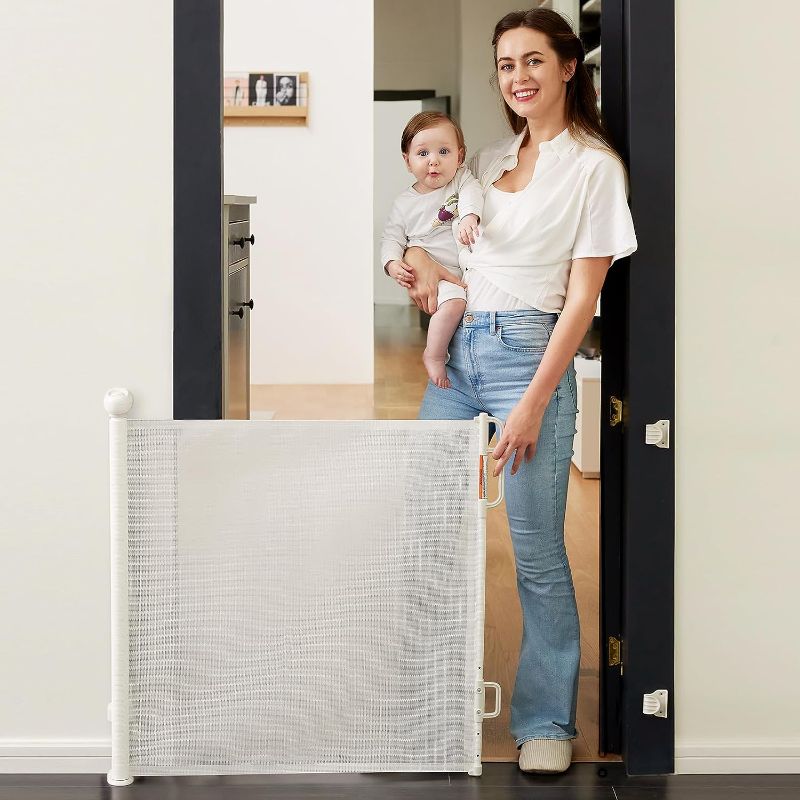 Photo 1 of Momcozy Retractable Baby Gate, 33" Tall, Extends up to 55" Wide, Child Safety Baby Gates for Stairs, Doorways, Hallways, Indoor, Outdoor(Black) 33" Tall x 55" Wide Cream