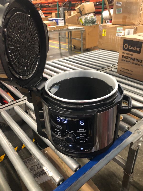 Photo 1 of Ninja FD401 Foodi 12-in-1 Deluxe XL 8 qt. Pressure Cooker & Air Fryer that Steams, Slow Cooks, Sears, Sautés, Dehydrates & More, with 5 qt. Crisper Basket, Deluxe Reversible Rack & Recipe Book, Silver 8 Quart 8-Quart/Stainless Steel Silver