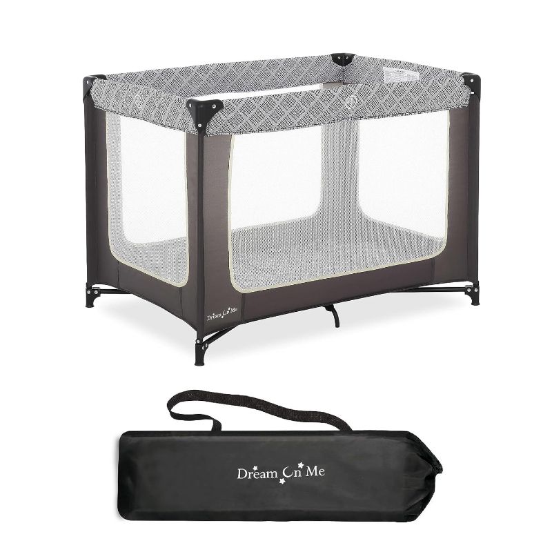 Photo 1 of Dream On Me Zoom Portable Playard in Dark Grey, Lightweight, Packable and Easy Setup Baby Playard, Breathable Mesh Sides and Soft Fabric - Comes with a Removable Padded Mat
