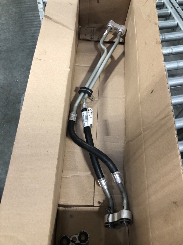Photo 1 of GM Genuine Parts 15194579 Engine Oil Cooler Inlet and Outlet Hose Kit with Clip, Connector, and Seal, Black
