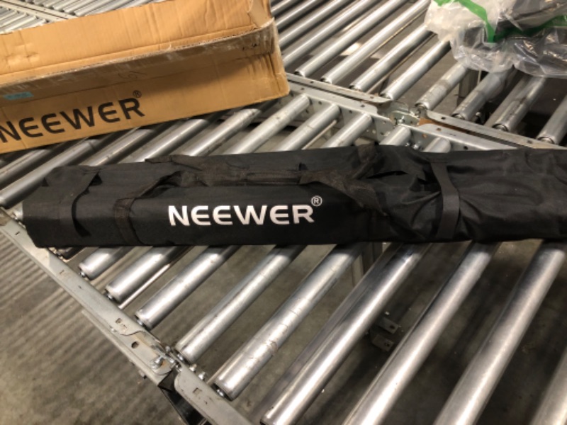 Photo 1 of NEEWER Photo Studio Backdrop Support System, 10ft x 7ft//3m x 2.1m Adjustable Background Stand with 4 Crossbars, 6 Backdrop Clamps, 2 Orange Sandbags, and Carrying Bag for Portrait Studio Photography