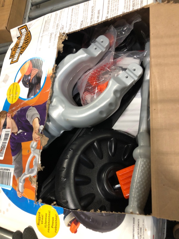 Photo 3 of Fisher-Price Harley-Davidson Tricycle with Handlebar Grips and Storage Area, Multi-Terrain Tires, Tough Trike [Amazon Exclusive]