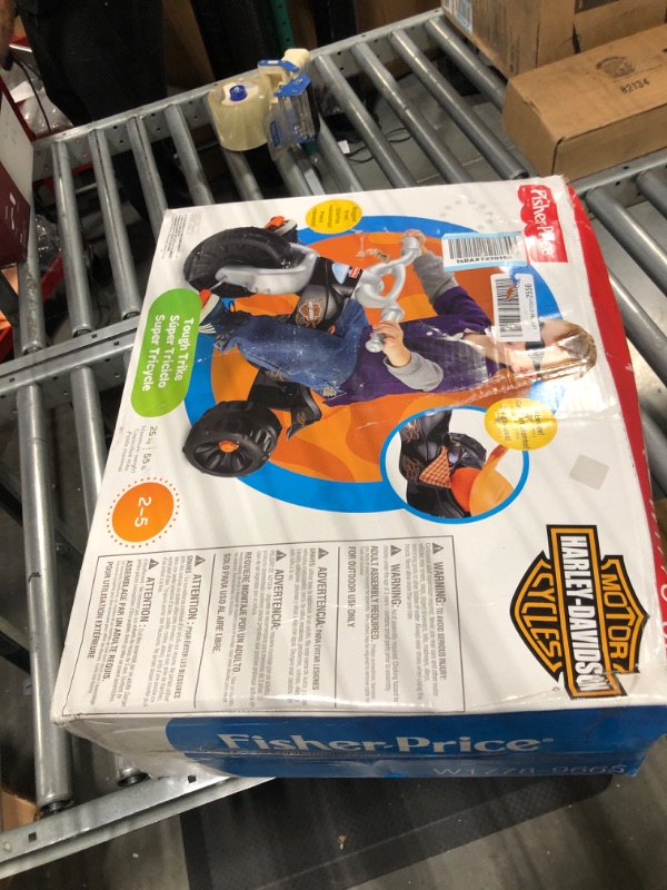 Photo 2 of Fisher-Price Harley-Davidson Tricycle with Handlebar Grips and Storage Area, Multi-Terrain Tires, Tough Trike [Amazon Exclusive]