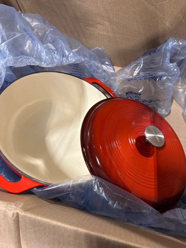 Photo 3 of Amazon Basics Enameled Cast Iron Covered Round Dutch Oven, 4.3-Quart, Red

*SMALL PAINT CHIP ON HANDLE*