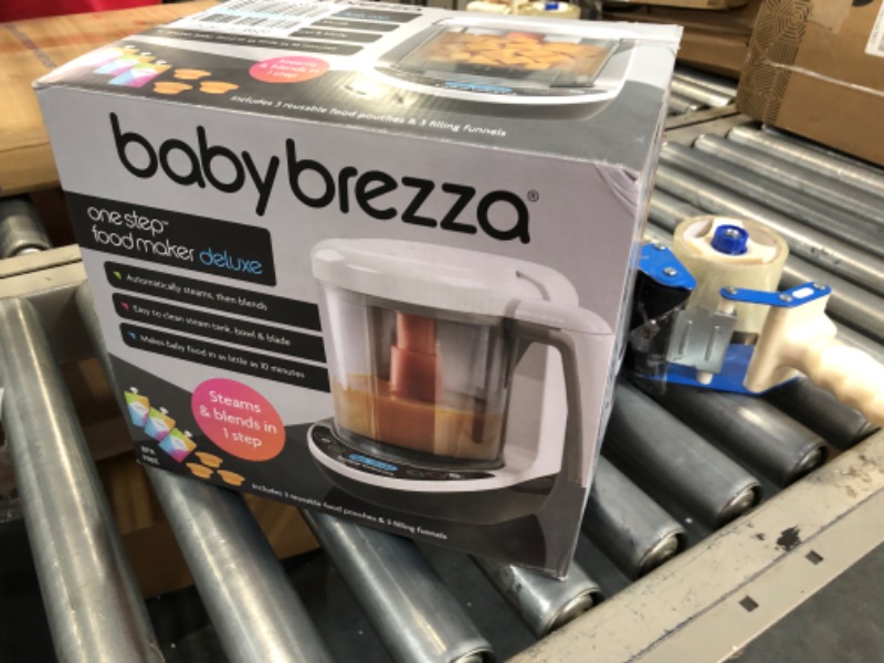 Photo 2 of Baby Brezza One Step Baby Food Maker Deluxe – Cooker and Blender in One to Steam and Puree Baby Food for Pouches - Make Organic Food for Infants and Toddlers - Set Includes 3 Pouches and 3 Funnels