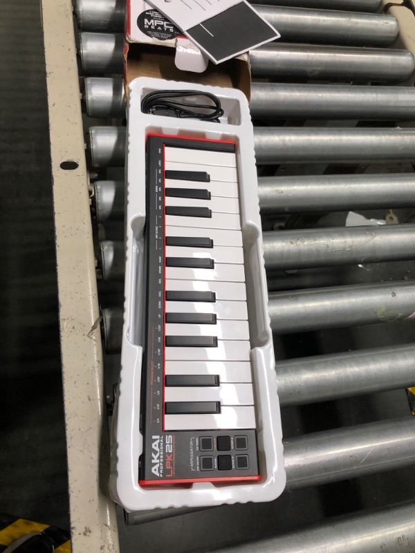 Photo 1 of AKAI Professional LPK25 - USB MIDI Keyboard Controller with 25 Responsive Synth Keys for Mac and PC, Arpeggiator and Music Production Software New Model