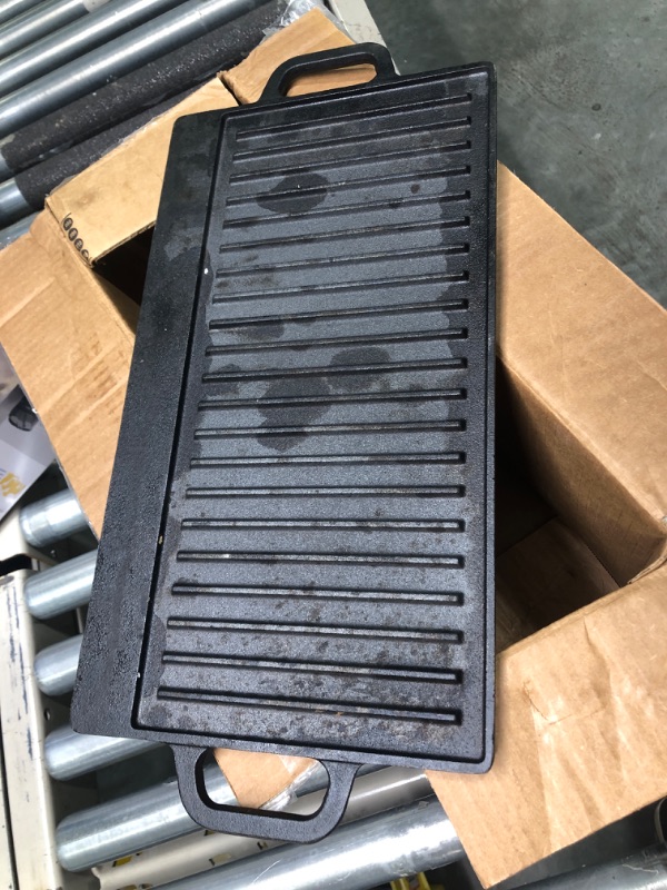 Photo 4 of HEAVILY USED.

Velaze Cast Iron Reversible Griddle, Grill Pan Griddle Grill with Dual Handles,20Inchx9 inch,Black 20x9 inch