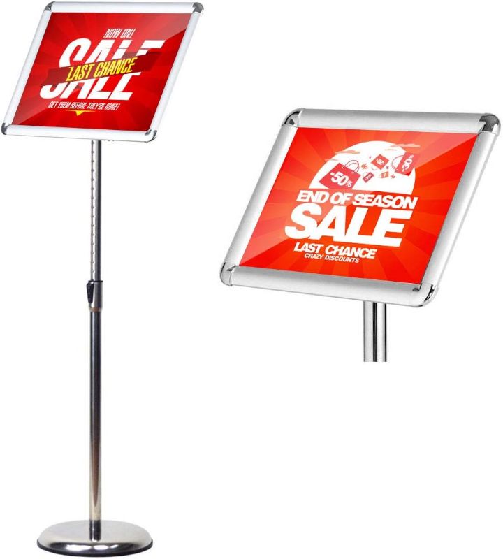 Photo 1 of HUAZI Floor Standing Sign Holder Pedestal Sign Stand for 11 x 17 inches Graphics, Rounded Corner Frame & Pole Height Adjustable - Color Black 11 X 17 Inches,black