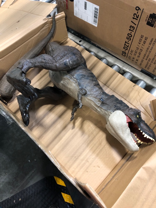 Photo 2 of Jurassic World Dominion Dinosaur T Rex Toy, Thrash ‘N Devour Tyrannosaurus Rex Action Figure with Sound and Motion Retail Packaging Toy