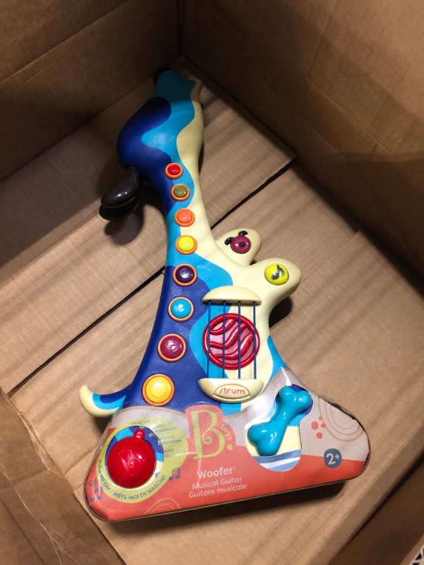 Photo 2 of B. toys- Woofer- Interactive Dog Guitar- Musical Toys- 3 Music Modes- Big & Colorful Buttons – 2 Years +