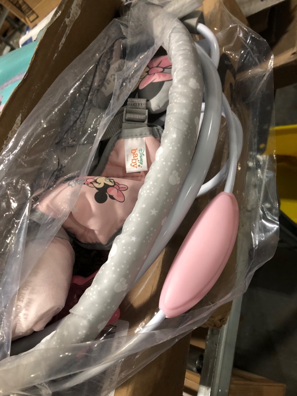 Photo 1 of Bright Starts Minnie Mouse Rosy Skies Baby Bouncer with Vibrating Infant Seat, Music & 3 Playtime Toys, 23x19x23 Inch (Pink)