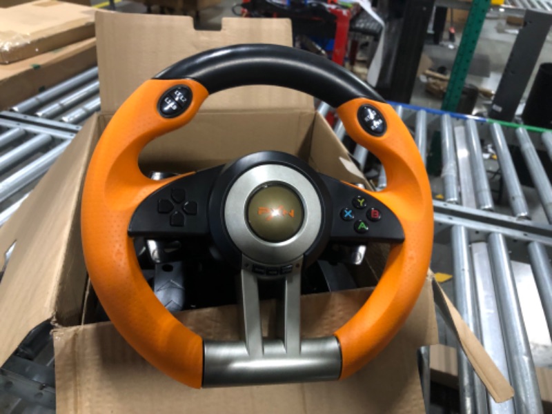 Photo 1 of Game Racing Wheel, PXN-V3II 180° Competition Racing Steering Wheel with Universal USB Port and with Pedal, Suitable for PC, PS3, PS4, Xbox One, Xbox Series S&X, Nintendo Switch - Orange