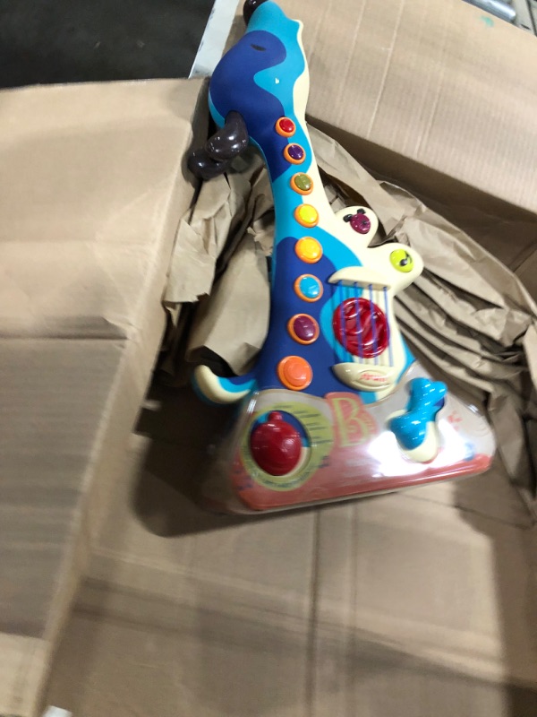 Photo 1 of B. toys- Woofer- Interactive Dog Guitar- Musical Toys- 3 Music Modes- Big & Colorful Buttons – 2 Years +