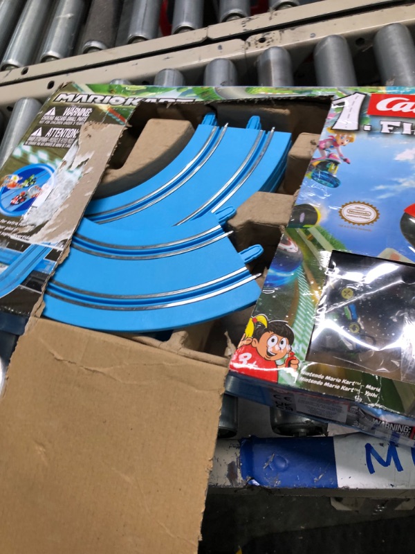 Photo 3 of Carrera First Mario Kart - Slot Car Race Track With Spinners - Includes 2 Cars: Mario and Yoshi - Battery-Powered Beginner Racing Set for Kids Ages 3 Years and Up Mario Kart w/ Spinners