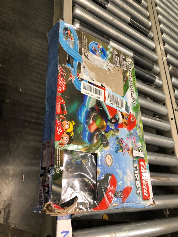 Photo 2 of Carrera First Mario Kart - Slot Car Race Track With Spinners - Includes 2 Cars: Mario and Yoshi - Battery-Powered Beginner Racing Set for Kids Ages 3 Years and Up Mario Kart w/ Spinners