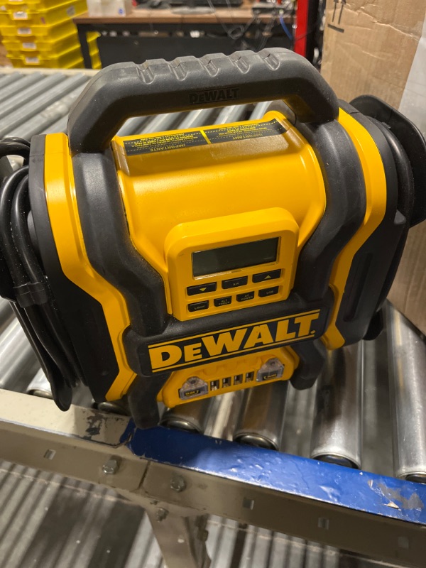 Photo 2 of DEWALT DXAEPS14 1600 Peak Battery Amp 12V Automotive Jump Starter/Power Station with 500 Watt AC Power Inverter, 120 PSI Digital Compressor, and USB Power , Yellow