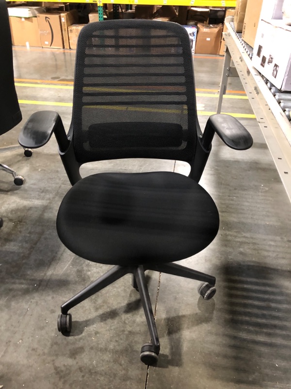 Photo 2 of ***CHAIR DOESNT MOVE UP AND DOWN***  

Steelcase Series 1 Office Chair - Ergonomic Work Chair with Wheels for Carpet - Helps Support Productivity - Weight-Activated Controls, Back Supports & Arm Support - Easy Assembly - Graphite
***Used, but in good cond